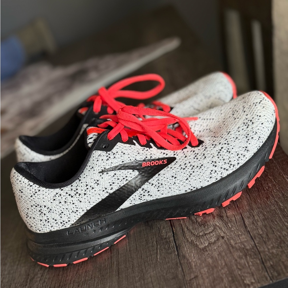 Brooks Black and White Running Shoes with Red Highlights